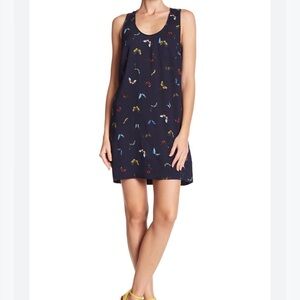 Elegant Black Sleeveless Dress with Butterfly Print